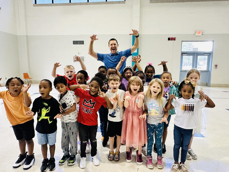 Andy Harkness imitates Wolfboy with a Sudduth first grade class
