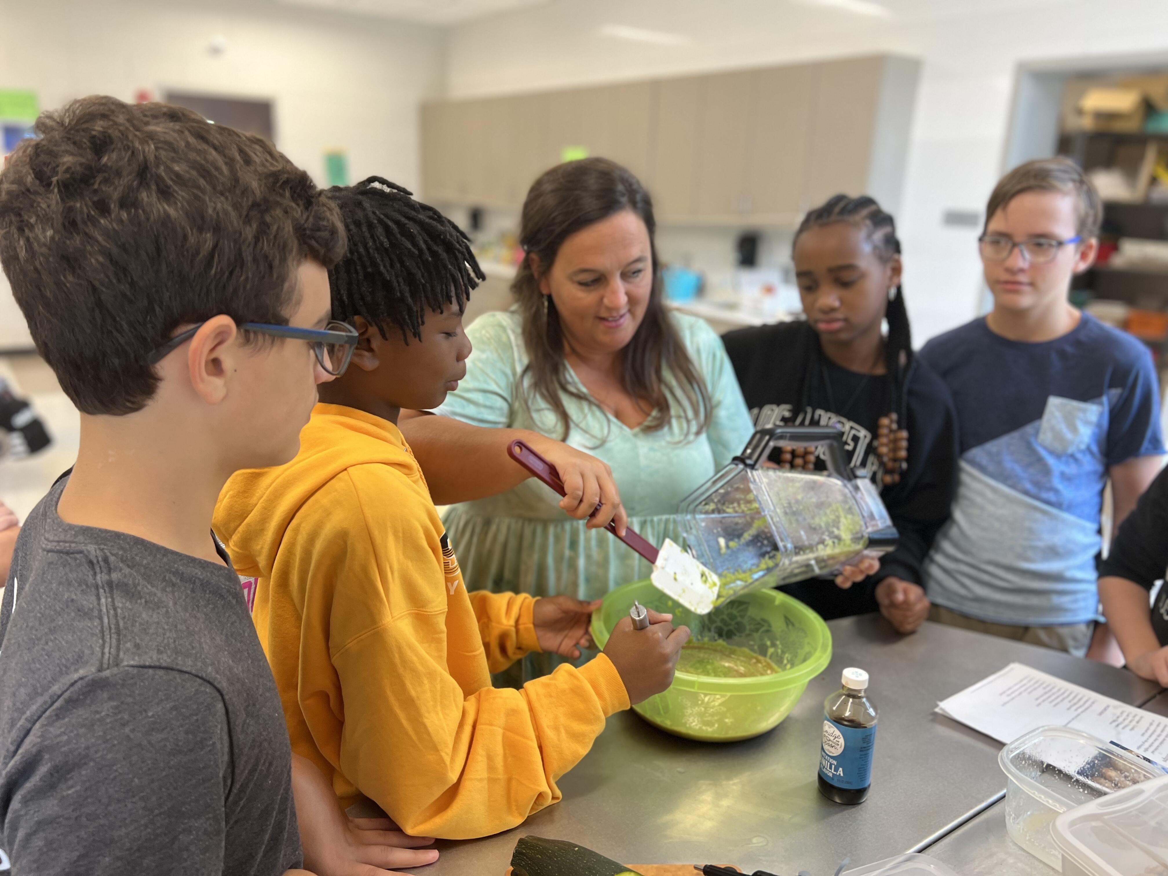 Students learn about cooking in the GrOW Classroom